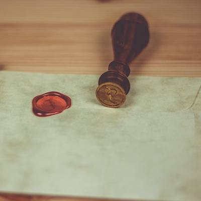 Seal wax stamp on letter, vintage communication.