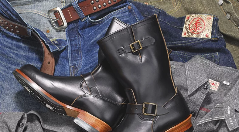 Leather boots and denim jeans with buckle details.